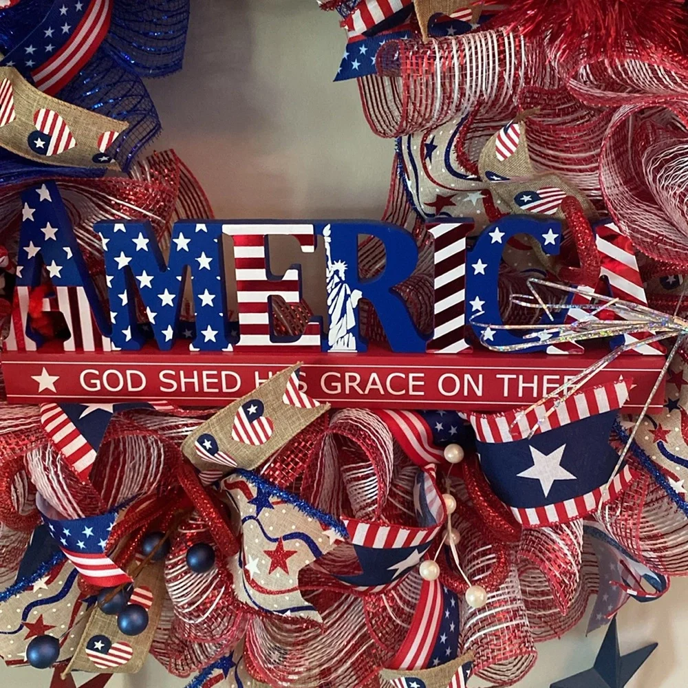 America, God shed his grace on thee! wreath